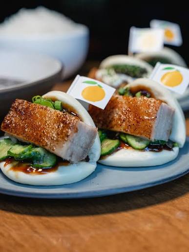 Momofuku signature dishes Pork Belly
Spicy Cucumbers
Roasted Lamb Rib